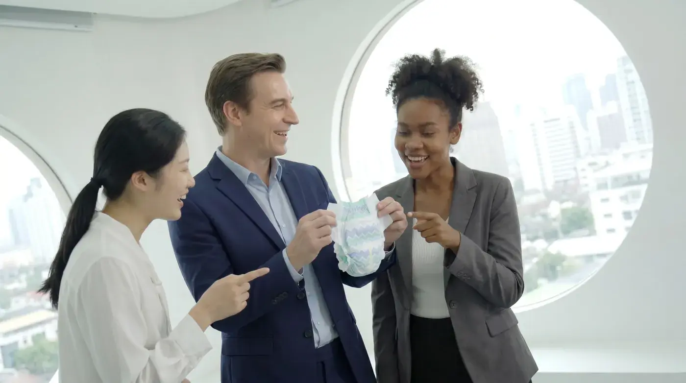 International business partners reviewing an Easy Hygienic hygiene product